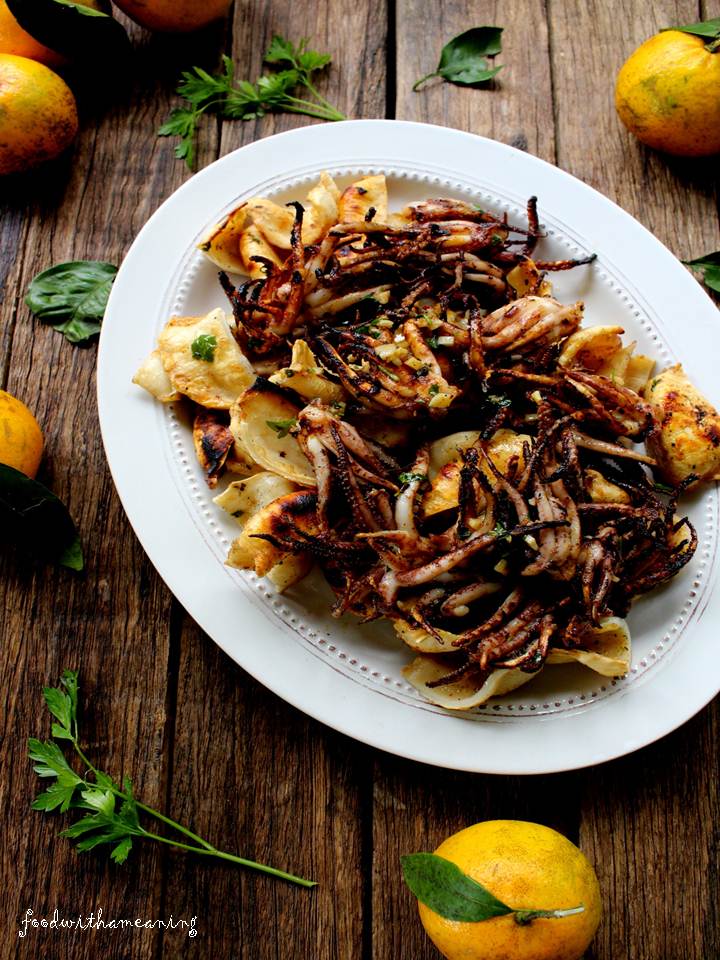 lulas grelhadas com molho de azeite e  mandarina