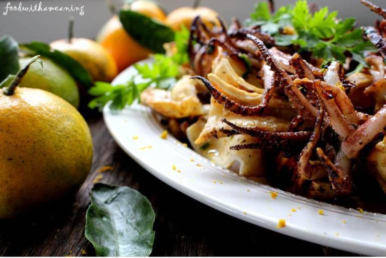 lulas grelhadas com molho de azeite e  mandarina